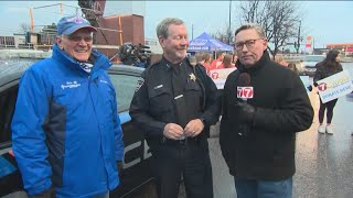 Boise Police Chief Mike Masterson makes a personal donation
