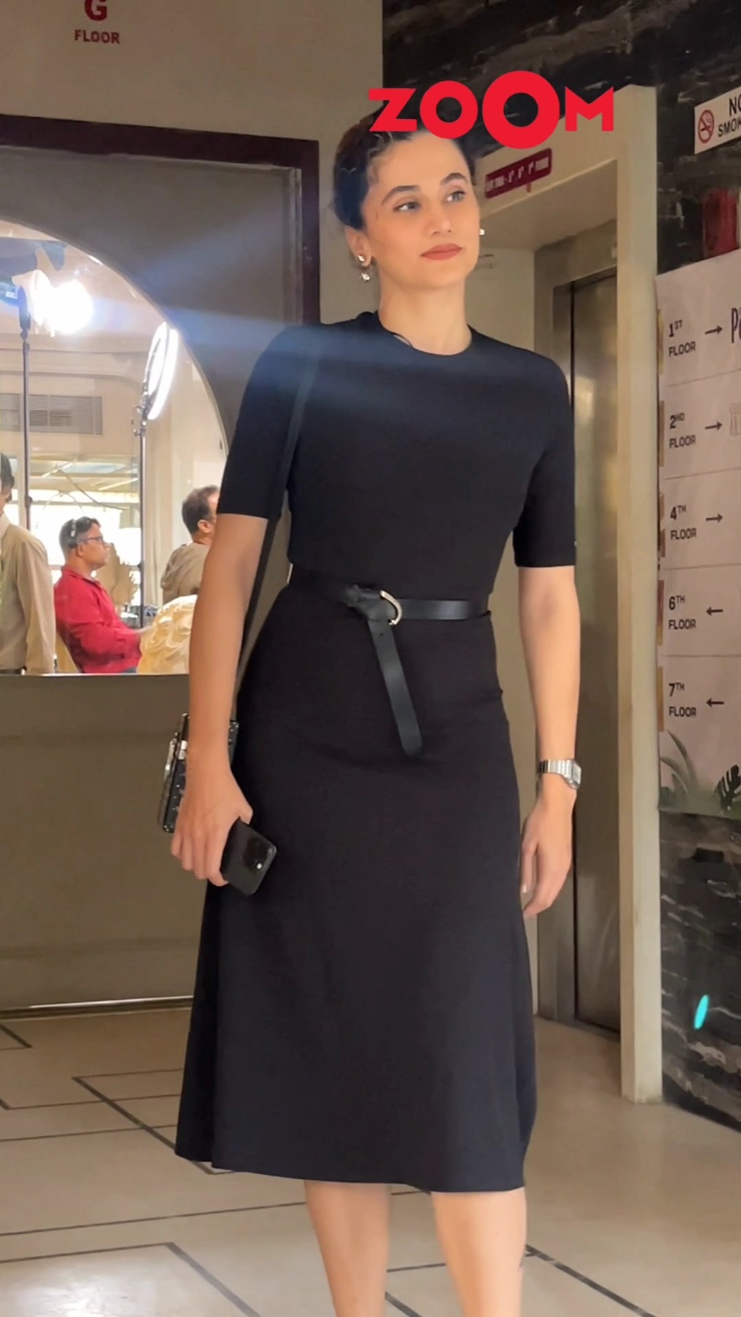 Taapsee Pannu looks beautiful in a black dress; BRIEFLY poses for the paps ? #taapseepannu
