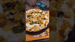 Chicken Exotic Pizza.