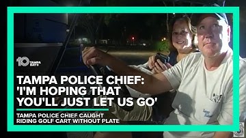 RAW: Tampa police chief, spouse caught riding golf cart without license plate