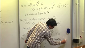 Solvability of Systems of Polynomial Equations over Finite Fields