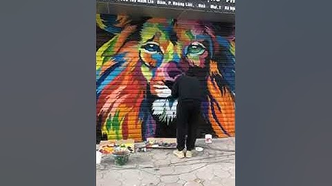 Vẽ tranh tường sư tử cho cửa cuốn ở Hoàn Kiếm, Hà Nội – Vẽ tranh tường Hà Nội rẻ đẹp 0799110022