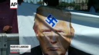 A small group of Mexicans protested on Thursday in the Mexican border city of Nuevo Laredo against U