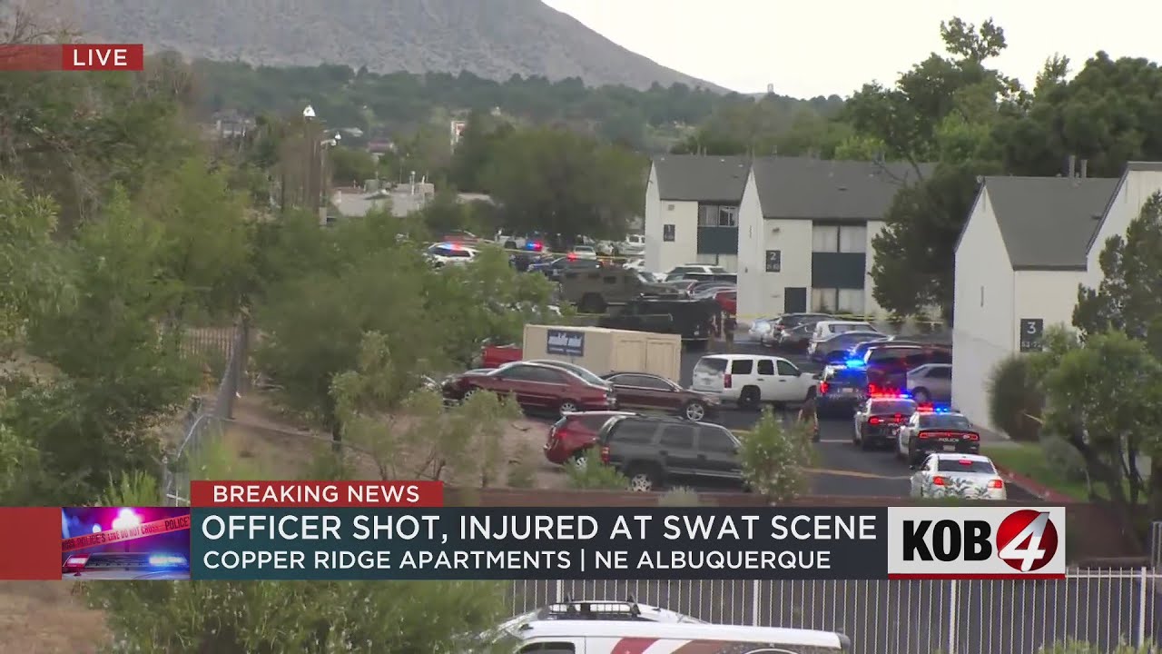 Police: Suspect killed, officer injured after SWAT standoff in NE ...