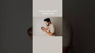 Posing a father with a newborn baby