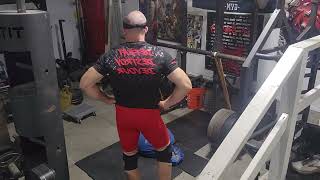 EMOM: Sprawl to sandbag over bar