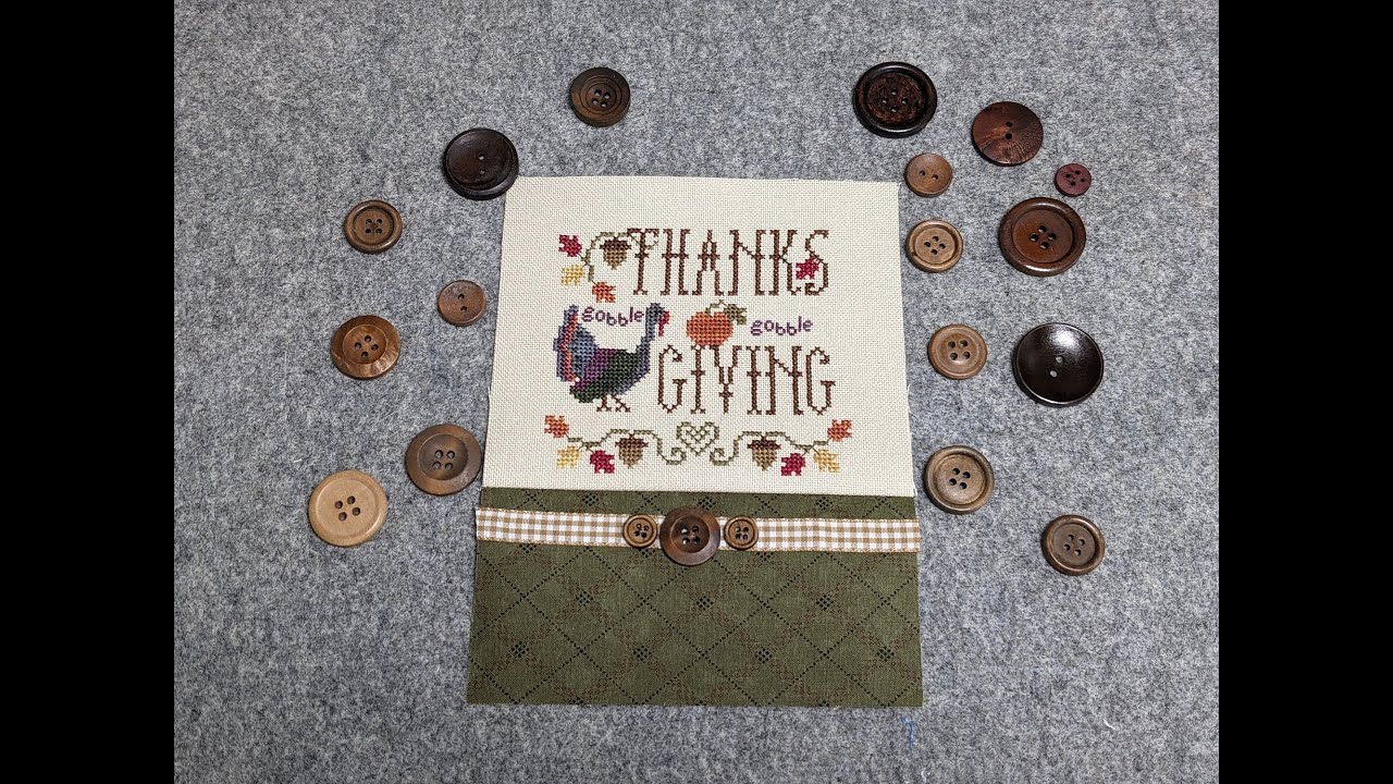 Flosstube Extra: мастер-класс по вышивке крестиком подушки с лентой и пуговицами