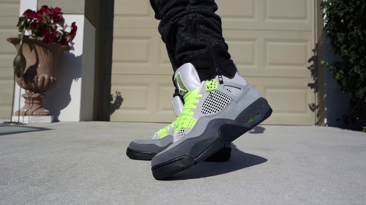 jordan 4 neon on feet