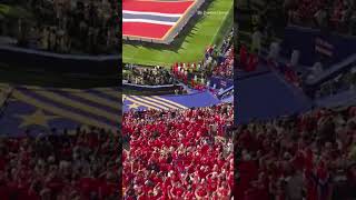 Norway fans welcome their team onto the field at World Cup game against Iraq
