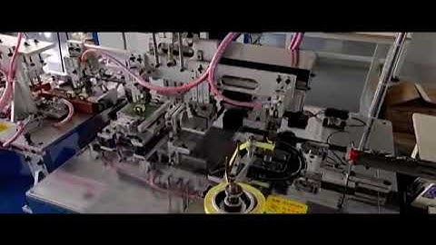 Automatic EE core taping & testing machine series. For transformers.