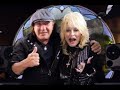 Dolly Parton gives Brian Johnson a private view of her tour bus