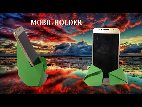 Video: Hvordan Dekorere En Mobiltelefon