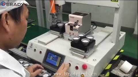 Automatic screw tightening machine to lock screws for the spot light. Brady model: SC-220II