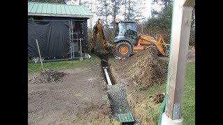 Case 580 Super N Backhoe digging Drainage ditch