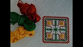 :  . . Hand embroidery.