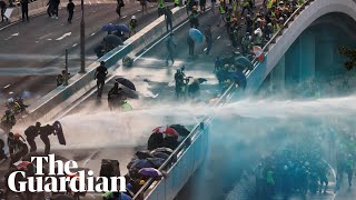 Hong Kong: police fire teargas after protesters throw molotov cocktails at government HQ