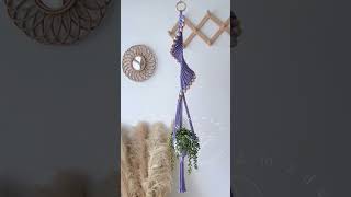 🌿💜 Embracing the enchantment of nature with this captivating spiral macrame plant hanger