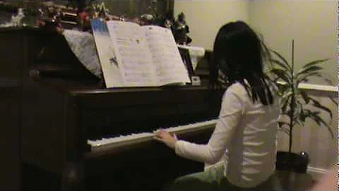 Kara playing piano