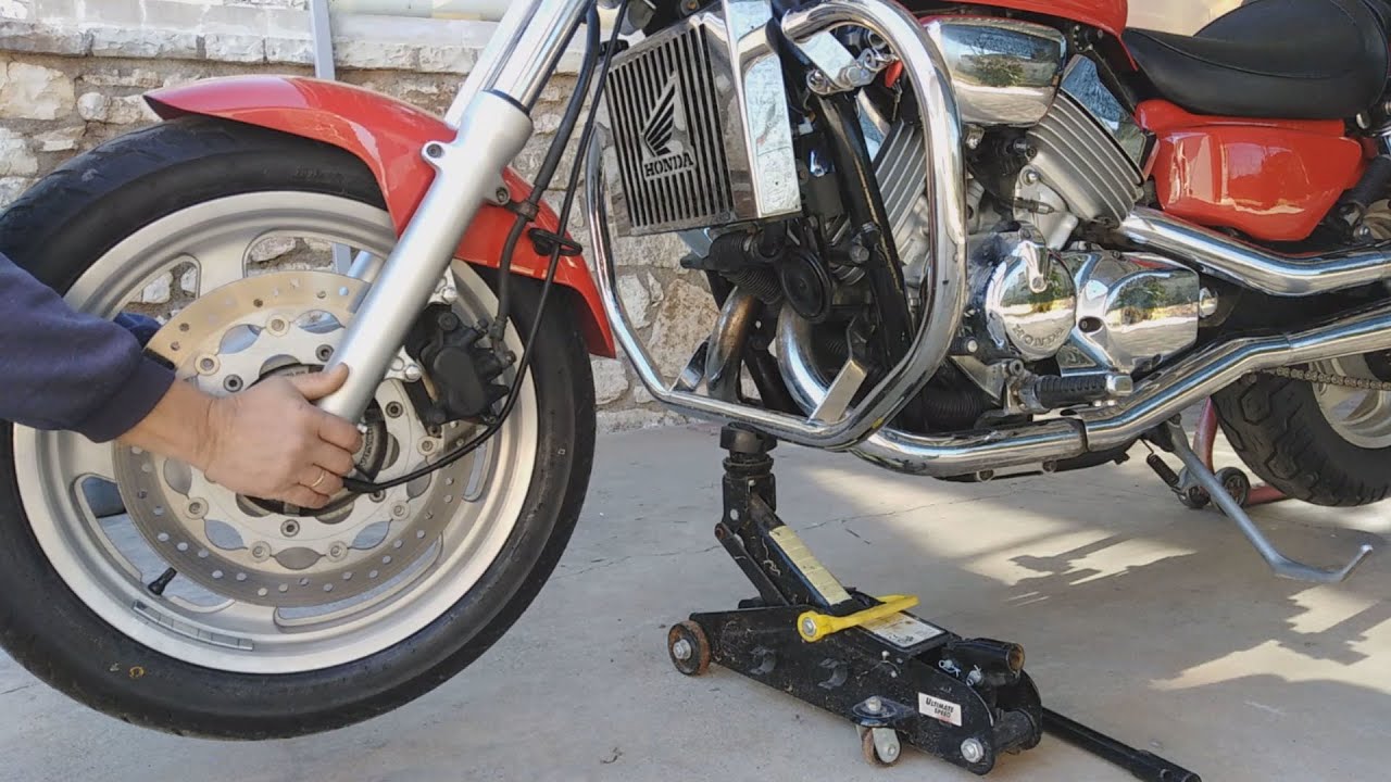 how to test your motorcycle steering head bearings YouTube