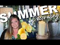 Summer decorating  layering decor pieces  adding color