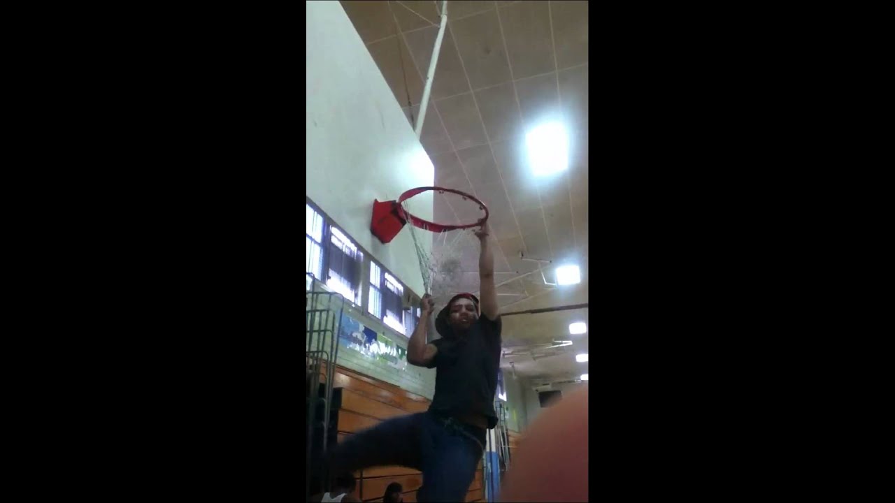 hanging on to basketball net YouTube