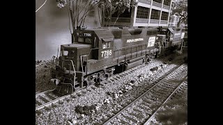 Take #02.. Penn Central # 7786 with a General freight and a Norfolk Southern surprise.