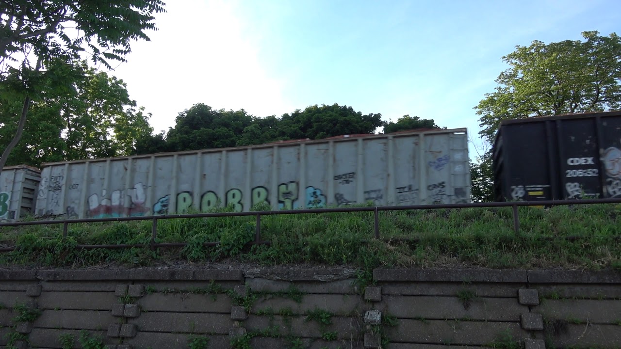 bnsf 5729 Driving a Car Under a Freight Train