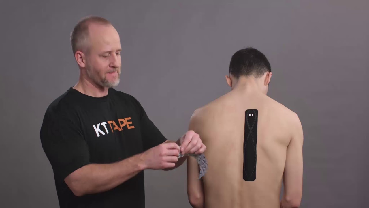 Кинезио тейпирование средней части спины.