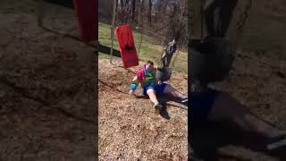 Big kid on swings take a nasty fall