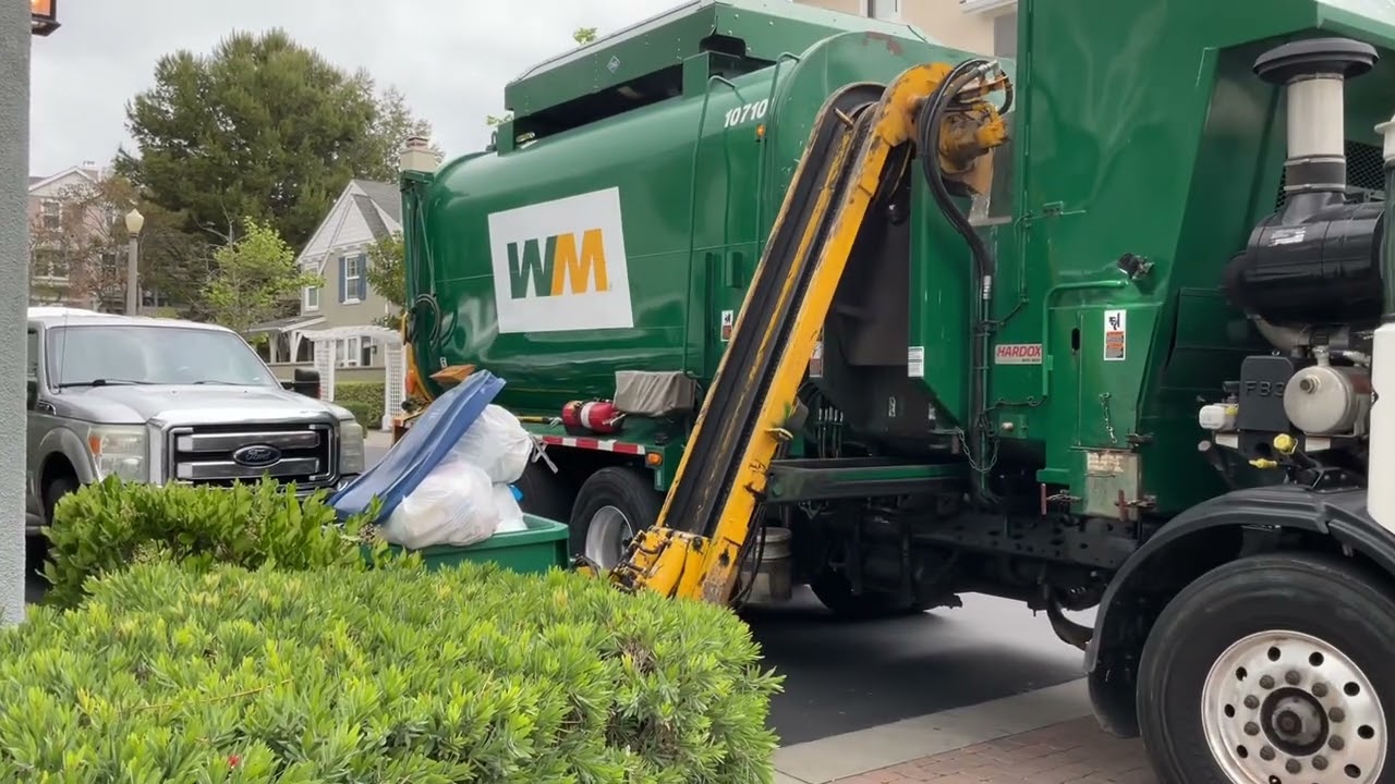 Waste Management of Orange County ~ Amrep N2 yellow arm trash truck on trash