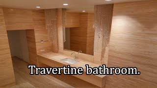 Travertine in the bathroom, travertine floors and walls.