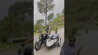 riding Royal Enfield sidecar. contact for hiring