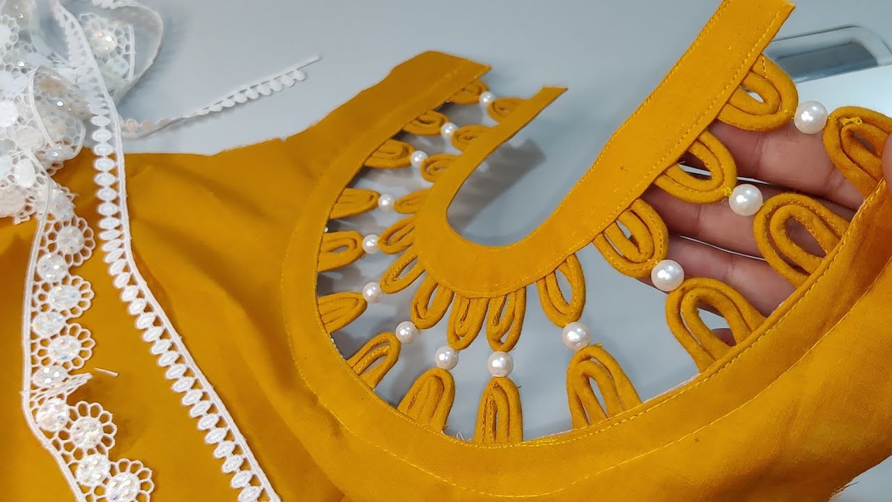 Создайте красивый дизайн круглой горловины с помощью бусин Дори и жемчуга.