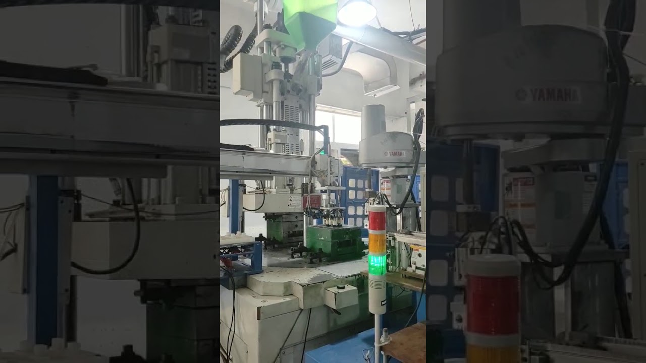 automatic production for small insert parts(55T rotary table vertical injection molding machine)