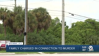 Father, teenage son arrested after man's body found in shallow pond