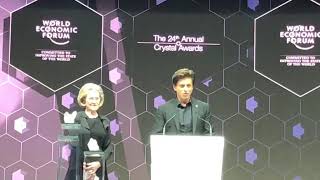 Actor Shah Rukh Khan being conferred a Crystal award