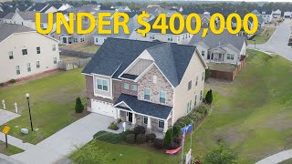 MUST SEE - NEW 5 BDRM MODEL HOME UNDER 400 000