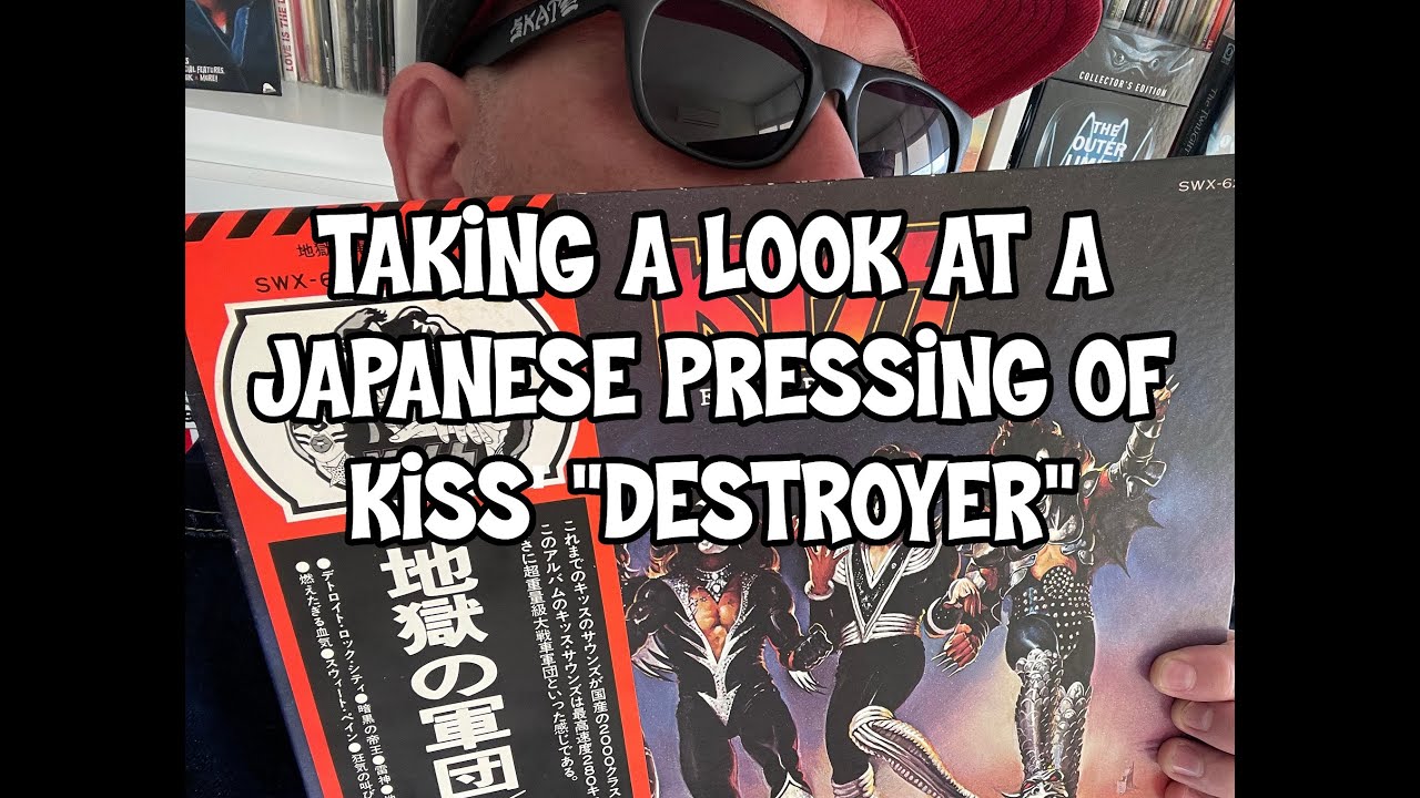 TAKING A LOOK AT KISS 