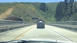 Driving Through the Devil's Slide Tunnel on Highway 1