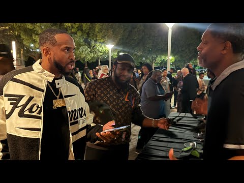 Wayne’s security gives Chase a hard time about his cell phone at the door at his comedy special