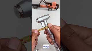 compact, pistol grip automotive safety hammer featuring a textured metal handle and a pointed glass