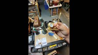 Packaging a Vintage Golf Desk Clock Before It Heads Out