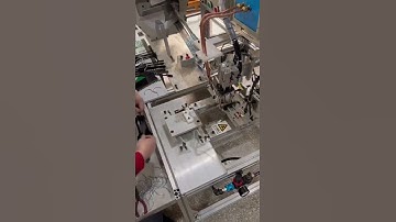 Semi auto clothes hanger hook assembly machine