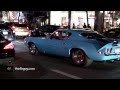 4K - Muscle car owners revving their engine in the street