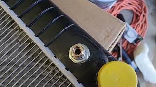 Removing Radiator Oil line retaining clip