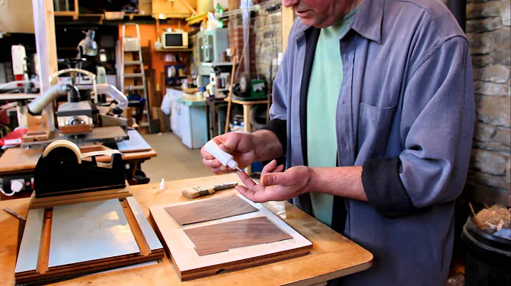 Andrew Crawford prepares some bookmatched veener (...