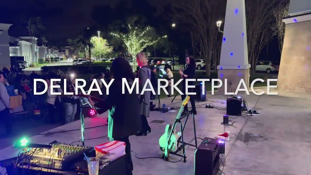 Dance Party 3X performs at Delray Marketplace.