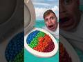 Eating M&Ms candy from Ocean Toilet