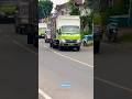 Heavy Trucks in Green, White, and Red on the Open Road #truck #semitruck #vehicles