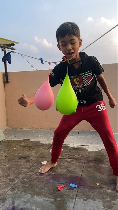 Double Impact: Twin Hanging Water Balloons Meet Their Match in a Single Punch! #balloons #world